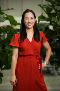 A photo of Karin Kuo in a red dress.