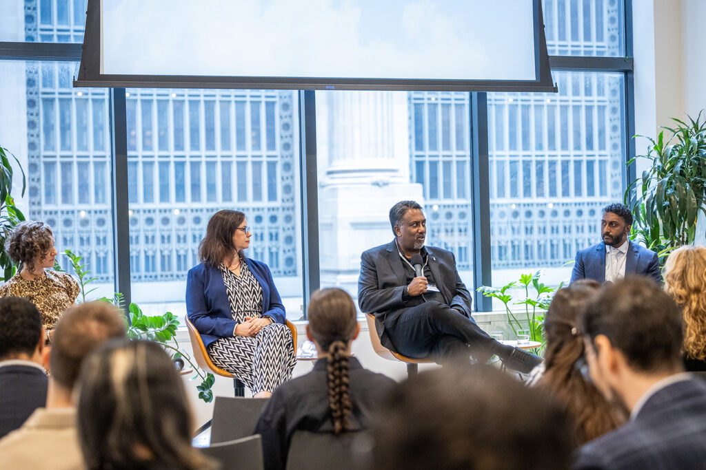 A view of the panel from the audience. From left to right: Sara Holoubek, Sarah Kaufman, ​Paul Cherukuri, Ph.D., and Dr. Chethan Sarabu. 