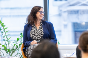 An image of Sarah Kaufman, Director of the NYU Rudin Center for Transportation, while speaking on the panel.